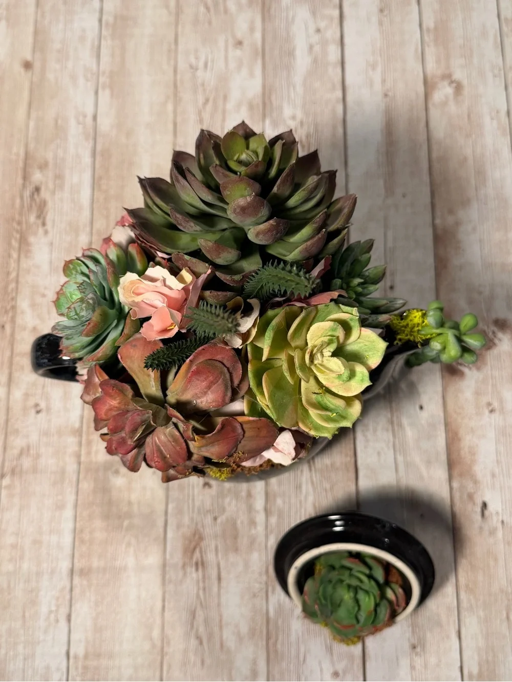 Black Ceramic Teapot Planter with Pink-Green Faux Succulent Arrangement